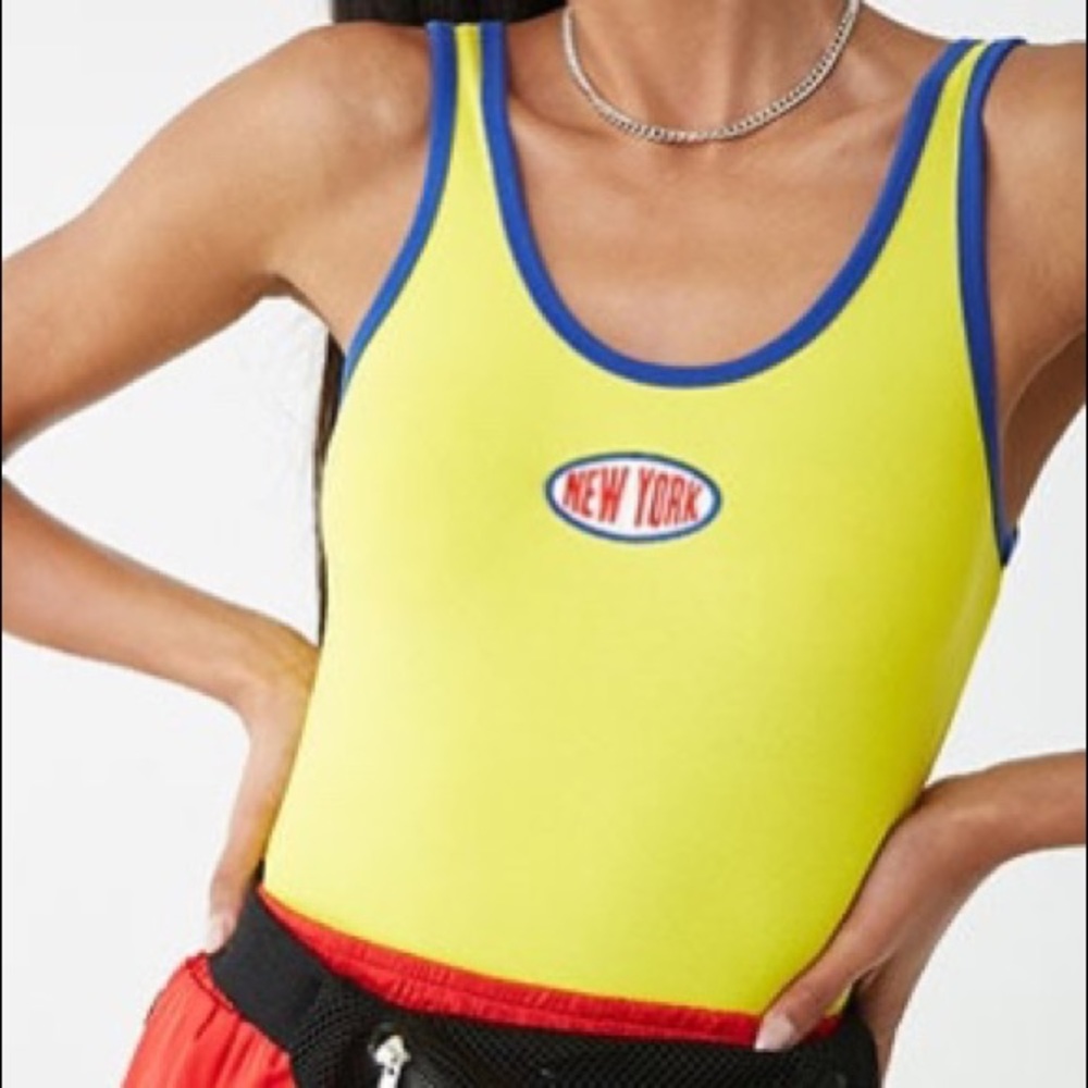 yellow new york bodysuit